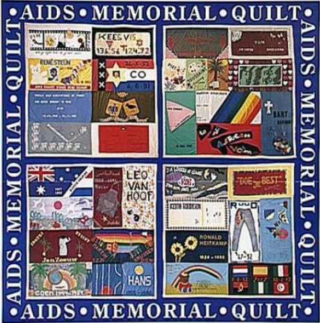 Slechts een handjevol mensen komt naar de quiltceremonie, de herdenking van Aidsslachtoffers, op het Stadhuisplein.